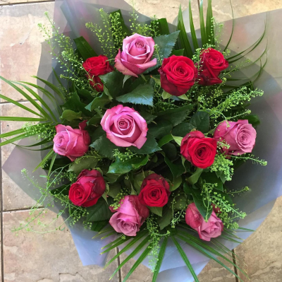 Dozen Pink and Red Roses - At Hearts and Flowers we are delighted to present this product available for flower delivery in Cardiff and surrounding areas Dozen Pink and Red Roses - At Hearts and Flowers we are delighted to present this product available for flower delivery in Cardiff and surrounding areas
