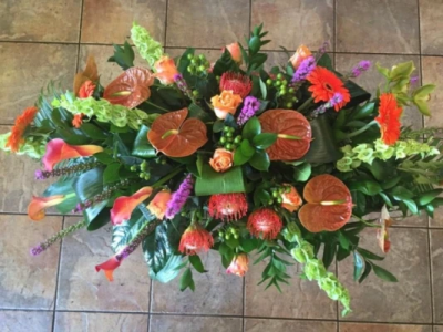 Casket spray - A contemporary modern casket spray, this is bold and simple yet beautiful with exotic blooms.
Available in 3ft, 4ft and 5ft. Casket spray - A contemporary modern casket spray, this is bold and simple yet beautiful with exotic blooms.
Available in 3ft, 4ft and 5ft.