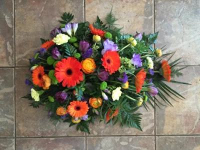 Orange Single Ended Spray - Traditional single ended spray in oasis made in orange and purple toned flowers. At Hearts and Flowers we are delighted to present this product available for flower delivery in Cardiff and surrounding areas and surrounding areas. Orange Single Ended Spray - Traditional single ended spray in oasis made in orange and purple toned flowers. At Hearts and Flowers we are delighted to present this product available for flower delivery in Cardiff and surrounding areas and surrounding areas.