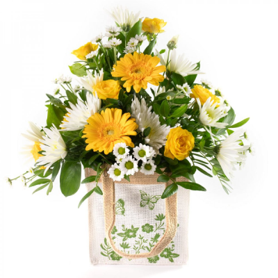 Lemon Drops - This little bag filled with flowers is the perfect way to send your message.
 Lemon Drops - This little bag filled with flowers is the perfect way to send your message.