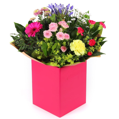 Petal Paradise - A lively bouquet featuring a bright mix of vibrant seasonal blooms. Complemented by lush green foliage and presented in a beautiful packaging, this arrangement is perfect for adding a pop of colour to any occasion Petal Paradise - A lively bouquet featuring a bright mix of vibrant seasonal blooms. Complemented by lush green foliage and presented in a beautiful packaging, this arrangement is perfect for adding a pop of colour to any occasion