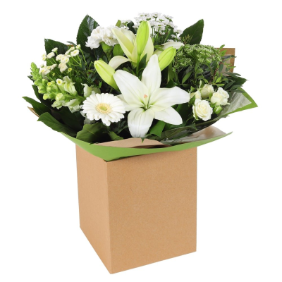 Classic Harmony - Share your sentiments with this beautiful arrangement of white and green blooms complemented by lush greenery. Presented in elegant wrapping. Classic Harmony - Share your sentiments with this beautiful arrangement of white and green blooms complemented by lush greenery. Presented in elegant wrapping.
